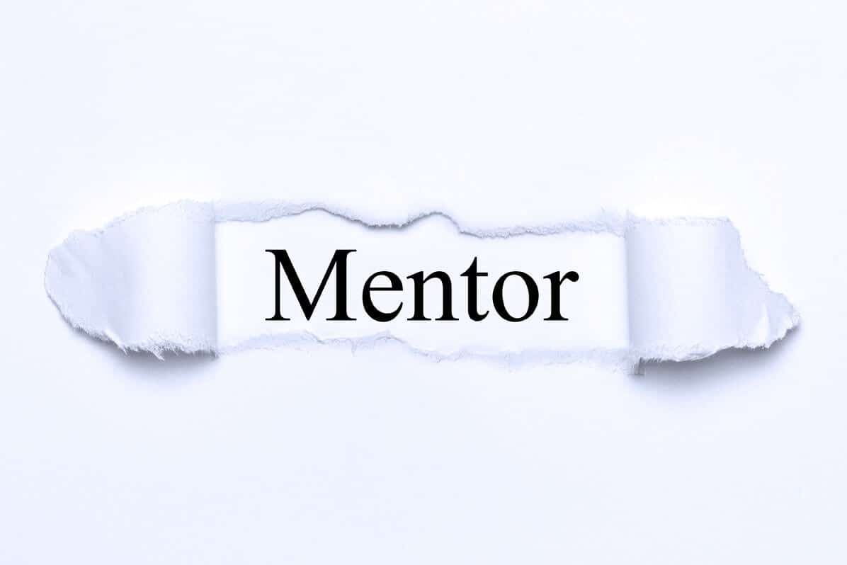 Wort Mentor auf Papier